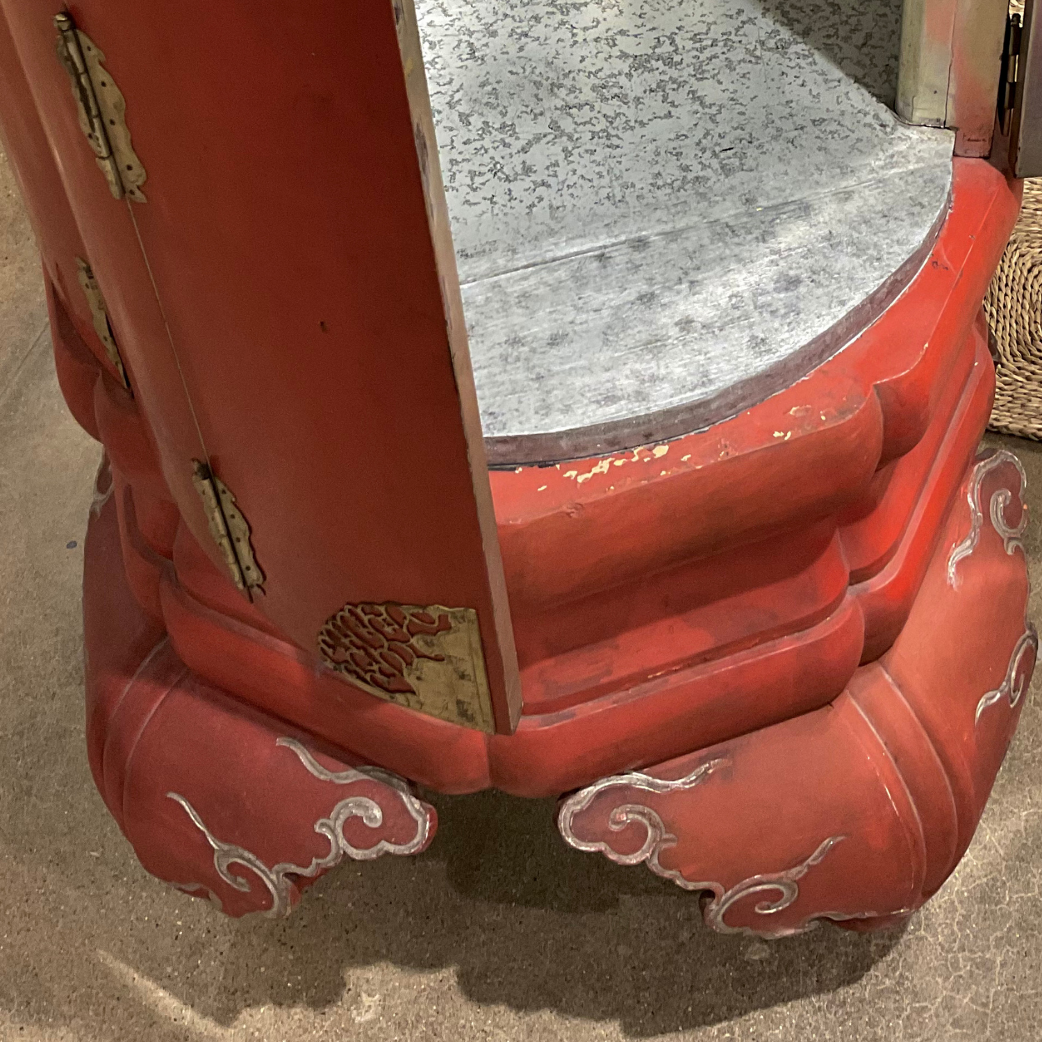 Pair antique red lacquer Gump's cabinets with original silver leaf interiors and metal hardware. Double door openings front and back. c1930s. Condition consistent with age.