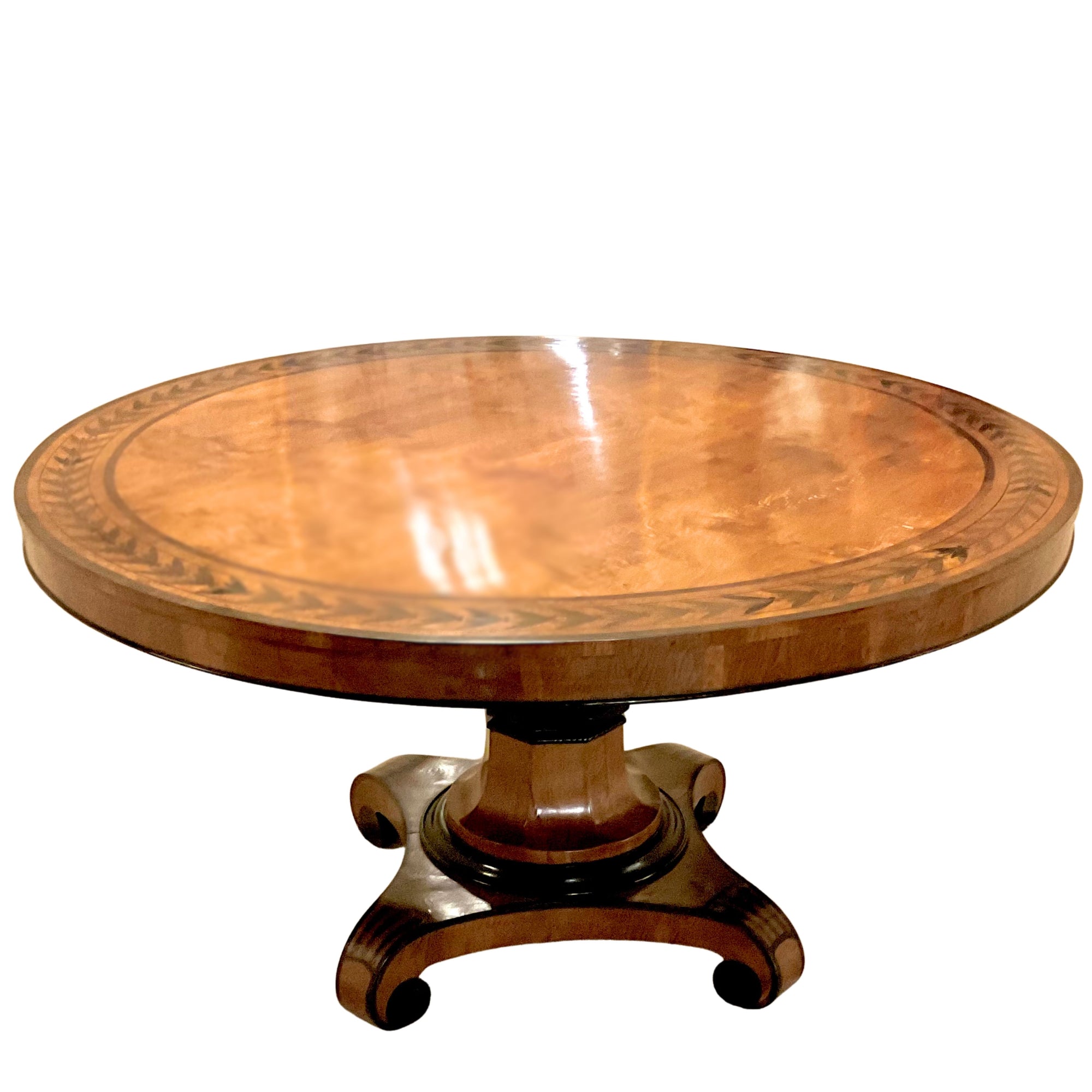 Early 19th Century Regency pedestal dining/center table with ebony marquetry inlay.