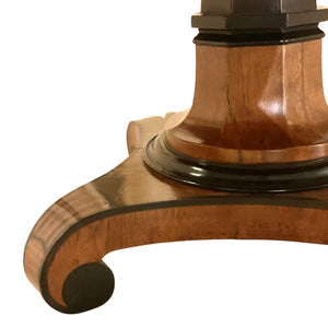Early 19th Century Regency pedestal dining/center table with ebony marquetry inlay.