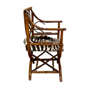 Chic antique zebra hide hair and bamboo chair.